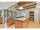 Gourmet kitchen with granite countertops, stainless steel appliances, and custom cabinetry at 2103 N Golfview Dr, Plant City, FL 33566
