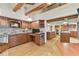 Spacious kitchen with custom wood cabinets, granite countertops, and stainless steel appliances at 2103 N Golfview Dr, Plant City, FL 33566