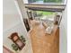 Spacious living room featuring ample seating, large windows, and hardwood floors at 2103 N Golfview Dr, Plant City, FL 33566