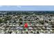 Expansive aerial view of a residential neighborhood, showcasing the home's location at 2115 Erin Dr, Holiday, FL 34690