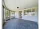 Spacious covered patio with decorative columns, offering a serene outdoor living space at 2115 Erin Dr, Holiday, FL 34690