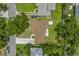 An aerial view of the property, showcasing the roof, backyard, and surrounding neighborhood at 2415 York N St, St Petersburg, FL 33710