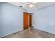 Cozy bedroom with terrazzo flooring, ceiling fan, and a closet at 2415 York N St, St Petersburg, FL 33710