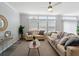 Cozy living room featuring lots of natural light with neutral paint and modern furniture at 246 Gretna St, Port Charlotte, FL 33954