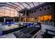 Exceptional outdoor living space with pool, spa, fire pit, bar, and screened enclosure at 29038 Picana Ln, Wesley Chapel, FL 33543