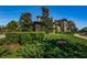 Exterior shot of a building with stone accents, lush landscaping, and a sign reading 'Residents Only No Trespassing' at 29038 Picana Ln, Wesley Chapel, FL 33543