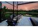 Inviting outdoor fire pit area with comfortable seating and scenic views at 29038 Picana Ln, Wesley Chapel, FL 33543