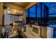 Outdoor kitchen boasts stainless steel appliances and a built-in grill at 29038 Picana Ln, Wesley Chapel, FL 33543
