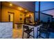 Stylish outdoor kitchen with a bar top, perfect for entertaining at 29038 Picana Ln, Wesley Chapel, FL 33543