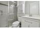 Clean bathroom features a glass-enclosed shower, vanity with granite counters, and modern fixtures at 30326 Ceasar Park Dr, Wesley Chapel, FL 33543