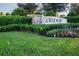 Elegant community entrance sign with lush landscaping and irrigation system at 30326 Ceasar Park Dr, Wesley Chapel, FL 33543