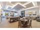 A cozy clubhouse with a fireplace and ample seating for gatherings at 30326 Ceasar Park Dr, Wesley Chapel, FL 33543