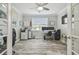 Well lit office with wood floors, ceiling fan, and large window for lots of natural light at 30326 Ceasar Park Dr, Wesley Chapel, FL 33543