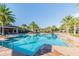 Enjoy the community pool with plenty of space to relax and enjoy the sun at 30326 Ceasar Park Dr, Wesley Chapel, FL 33543