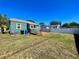 Lush backyard showcasing a charming wooden deck and well-kept lawn at 3110 10Th N Ave, St Petersburg, FL 33713