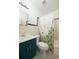 Updated bathroom with black and white tile floors, and modern vanity at 3110 10Th N Ave, St Petersburg, FL 33713