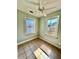 Small bedroom with bright windows and neutral tile floors at 3110 10Th N Ave, St Petersburg, FL 33713