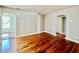 Open floor plan showcasing hardwood floors and multiple entries for a seamless transition between spaces at 3110 10Th N Ave, St Petersburg, FL 33713