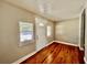 Inviting living room with pristine hardwood floors, and a door that adds natural light at 3110 10Th N Ave, St Petersburg, FL 33713