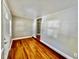 Spacious living room with beautiful hardwood floors, neutral walls, and doorway that enhances flow at 3110 10Th N Ave, St Petersburg, FL 33713