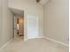 Bedroom area featuring a closet and an open doorway to other rooms in the home at 3262 Westcott Ct, Palm Harbor, FL 34684