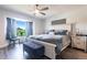 Bright bedroom with a large window, plush furnishings, and modern decor at 3312 Kenmore Dr, Sarasota, FL 34231