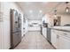 Spacious kitchen with white cabinets, stainless steel appliances, and lots of counter space at 3312 Kenmore Dr, Sarasota, FL 34231