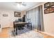Bright office space features hardwood floors, a decorative rug, and golf-themed artwork at 3312 Kenmore Dr, Sarasota, FL 34231
