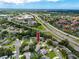 Aerial view of a house with a pool in a suburban neighborhood at 335 Palmdale Dr, Oldsmar, FL 34677