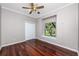 Bedroom with a closet, ceiling fan, and natural light from a window at 335 Palmdale Dr, Oldsmar, FL 34677