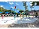 Community pool and splash pad with colorful water features and lounge chairs at 335 Palmdale Dr, Oldsmar, FL 34677