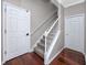 Carpeted staircase with handrail offers access to the second floor at 335 Palmdale Dr, Oldsmar, FL 34677