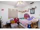 Bedroom featuring a ceiling fan, some décor, and natural light at 3440 Pittman Rd, Dover, FL 33527