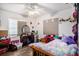 Bedroom featuring plenty of natural light and wood-look floors at 3440 Pittman Rd, Dover, FL 33527