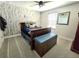 Serene bedroom with tranquil ambiance, neutral colors, cozy furniture, and soft lighting for relaxation and restful sleep at 3984 Maurice Ave, Odessa, FL 33556