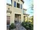 Inviting front entrance with manicured landscaping and a brick walkway at 3984 Maurice Ave, Odessa, FL 33556