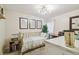 Bright bedroom featuring modern decor, ample lighting, and a cozy sleeping space at 4114 Pinelake Ln # 202, Tampa, FL 33618