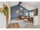 Inviting living room with a vaulted ceiling, brick fireplace, comfortable couch, and stylish decor at 4114 Pinelake Ln # 202, Tampa, FL 33618