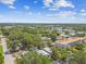 An aerial view of the neighborhood and cityscape featuring lush, mature trees at 483 32Nd N Ave, St Petersburg, FL 33704