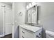 Bathroom showcasing marble vanity, modern fixtures, and a clean, bright aesthetic at 483 32Nd N Ave, St Petersburg, FL 33704