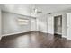 This bedroom features wood floors, two windows, closet and a door to the outside at 483 32Nd N Ave, St Petersburg, FL 33704