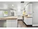 Well-equipped kitchen featuring butcher block countertops, stainless steel appliances, and white cabinetry at 483 32Nd N Ave, St Petersburg, FL 33704