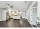 Bright living room featuring modern, minimalist design with hardwood floors, stainless appliances and island at 483 32Nd N Ave, St Petersburg, FL 33704