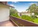 Balcony view overlooking landscaped grounds and building at 501 E Bay Dr # 802, Largo, FL 33770