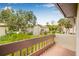 Balcony view showcasing the landscape, mature trees, and the surrounding community at 501 E Bay Dr # 802, Largo, FL 33770