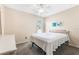 Bedroom with neutral paint, ceiling fan, and bright window views at 501 E Bay Dr # 802, Largo, FL 33770