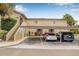Spacious two-story condo with covered parking and well-maintained landscaping and direct access to unit at 501 E Bay Dr # 802, Largo, FL 33770