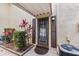 Inviting front door with decorative shutters and manicured landscaping welcomes you home at 501 E Bay Dr # 802, Largo, FL 33770
