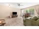 Comfortable living area with tile flooring, ceiling fan and lots of natural light at 501 E Bay Dr # 802, Largo, FL 33770