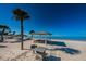 Beautiful beach featuring picnic areas and clear blue water, offering a perfect spot for seaside relaxation and recreation at 5030 Herring Ct, New Port Richey, FL 34652
